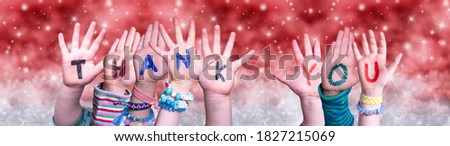 Children Hands Building Word Thank You, Red Christmas Background
