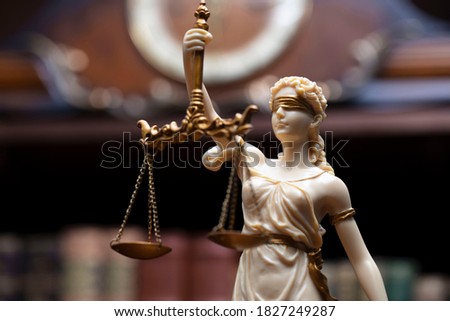 Law concept. Justice symbols on wooden table.