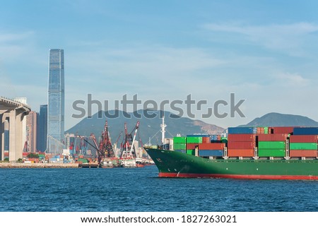 Cargo ship in Victoria Harbor of Hong Kong 
