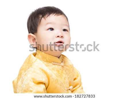 Chinese baby boy looking up
