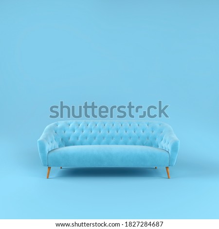 Stylish blue fabric sofa with wooden legs on blue background with shadow. Fashionable comfortable single piece of furniture. Blue interior, showroom. Vilyura, velvet sofa. Luxury couch front view Royalty-Free Stock Photo #1827284687