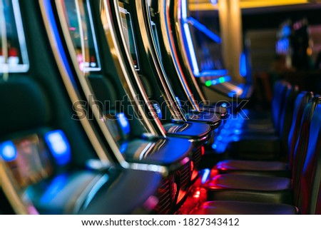 close up background of slot machine in casino club entertainment  leisure concept Royalty-Free Stock Photo #1827343412
