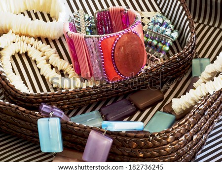 Divers costume jewelry in basket Royalty-Free Stock Photo #182736245