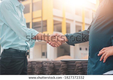 Close up Engineer shake hand at construction site in concept teamwork success achievement partner  