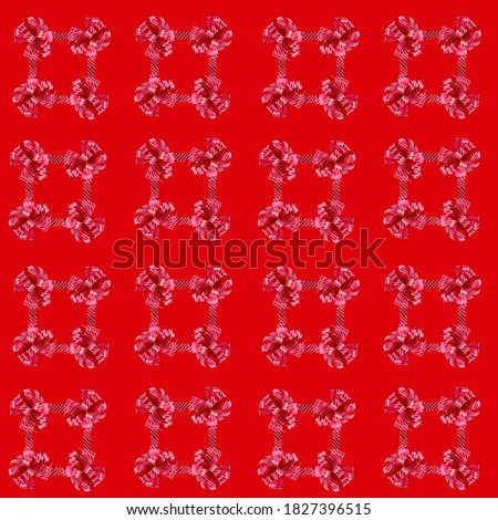 Red bow of decorative ribbon on a different background, a seamless pattern.