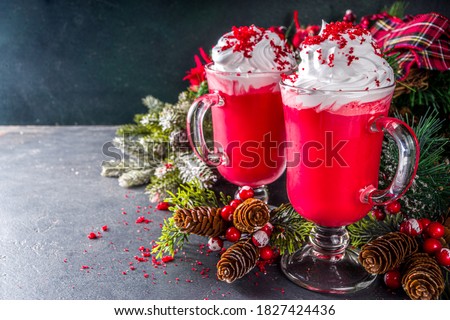 Trendy original winter Christmas hot chocolate recipe idea, Red velvet hot chocolate over festive background copy space