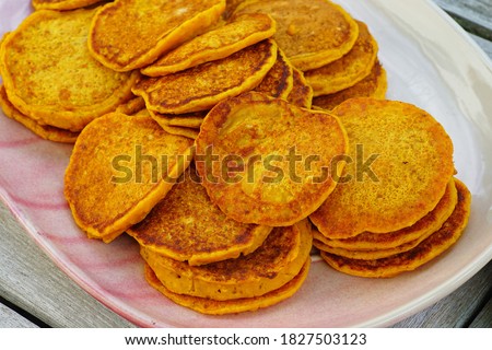 Platter of vegan pumpkin pancakes in the fall