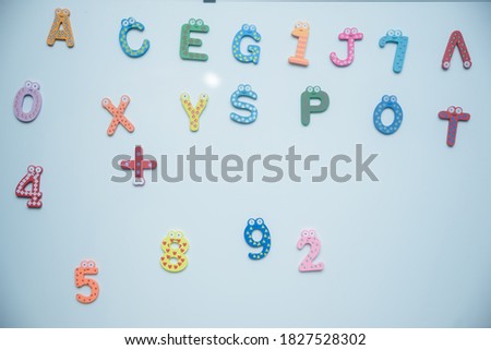 Detailed plastic letters on a pure white background