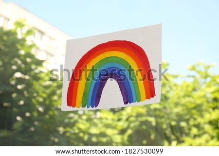 Picture of rainbow on window glass indoors. Stay at home concept