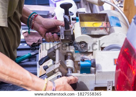 Machine making of duplicate metal key. locksmith