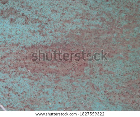 rusty metal with peeling paint as a background
