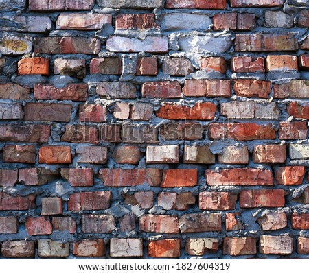 Background old cracked brick wall, brown textured surface