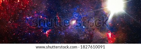 Star cluster and nebula - A cloud in space. Abstract astronomical galaxy. Elements of this image furnished by NASA.