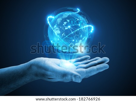 Projecting The Future. A hand holding a holographic projection. Royalty-Free Stock Photo #182766926