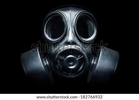 A black military gas mask for protection Royalty-Free Stock Photo #182766932