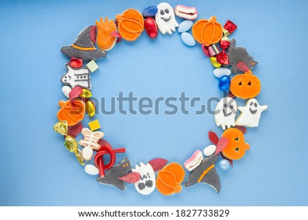 Halloween Jack o Lantern cookies, pumpkin, ghost, black cat, witch hat. Trick or Treat  background
