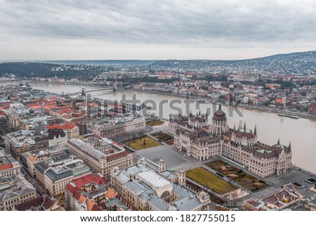Aerial drone shot of Hungarian Parliament by Danube in Kossuth Square before Budapest sunrise Royalty-Free Stock Photo #1827755015