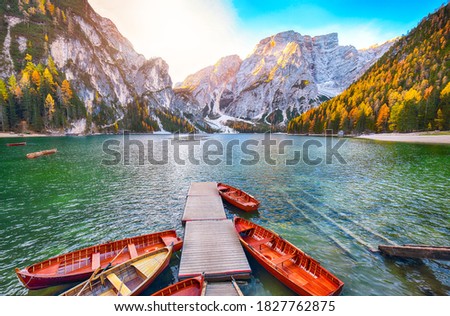 Amazing scenery of famous alpine lake Braies at autumn during sunrise. Location:  national park Fanes-Sennes-Braies, region Trentino-Alto Adige , province Bolzano, Italy, Europe