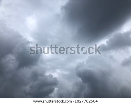 Atmosphere of overcast dusk sky before to rainy. Natural gloomy sky weather background. Dramatic storm cloudy and dark sky. Dark clouds sky.