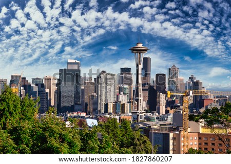 Seattle City Skyline, Washington, United States of America. Modern American City on the West Coast during a Sunny and Cloudy day.