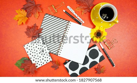 Autumn Fall Halloween Thanksgiving theme desktop workspace with mockups on stylish orange textured background. Top view blog hero header creative composition flat lay.
