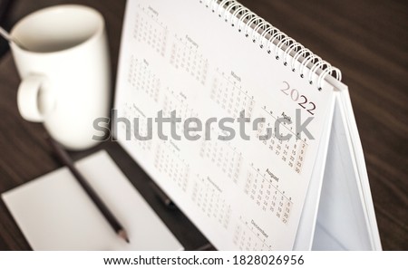 Calendar 2022 on wooden desk
