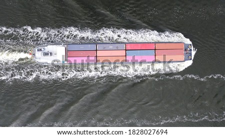 container ship loaded with colorful cargo