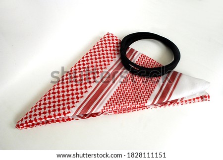 Arabic traditional clothing accessories Agal and Shemagh isolated on white background, Royalty-Free Stock Photo #1828111151
