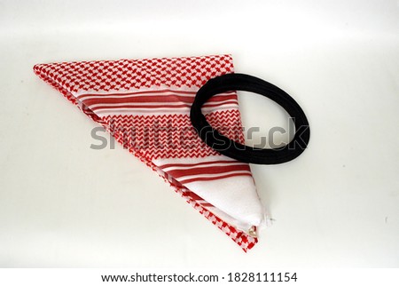 Arabic traditional clothing accessories Agal and Shemagh isolated on white background, Royalty-Free Stock Photo #1828111154