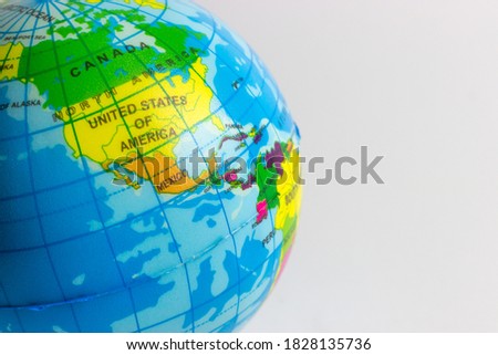 close up of plastic globe showing usa with white background 
