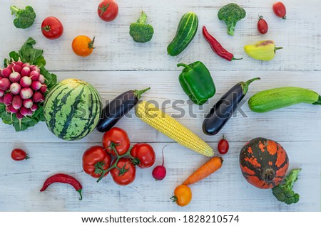 vegetables frame on white wooden background