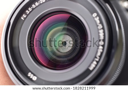 Close up of optical lens, camera lens macro, closed aperture