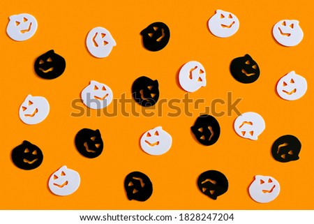 Halloween seamless pattern on a yellow background. Halloween symbols pumpkin pattern. Halloween pattern. Halloween concept. Flat lay.