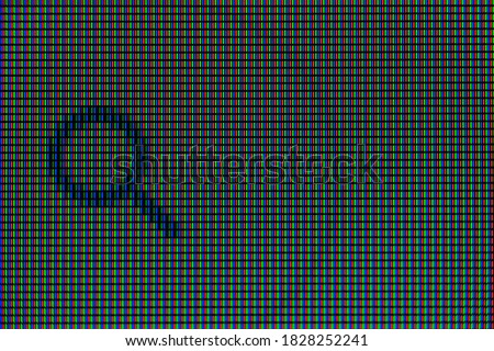 red green and blue pixels on the monitor matrix close up