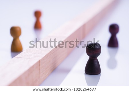 The concept of misunderstanding, a barrier in relations, denial of society. Barriers between people, prejudice, racism. Racial discrimination, apartheid.	
 Royalty-Free Stock Photo #1828264697