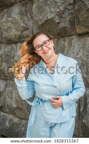 Happy smiling beautiful plus size model . Portrait large girl smiling on a sunny day with good mood, Photo of new age standard of beauty