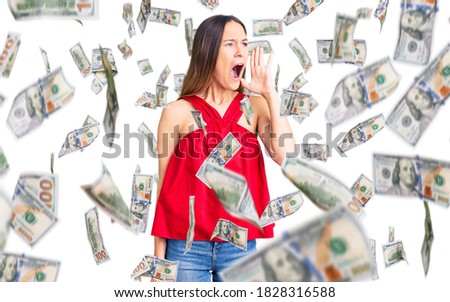 Beautiful brunette young woman wearing casual clothes shouting and screaming loud to side with hand on mouth. communication concept.