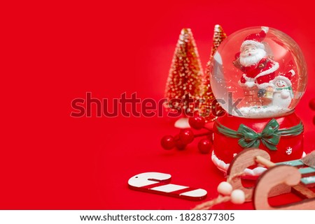 Christmas composition, gifts on red background, copy space