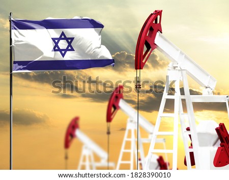 Oil rigs against the backdrop of the colorful sky and a flagpole with the flag of Israel. The concept of oil production, minerals, development of new deposits.