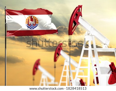 Oil rigs against the backdrop of the colorful sky and a flagpole with the flag of French Polynesia. The concept of oil production, minerals, development of new deposits.