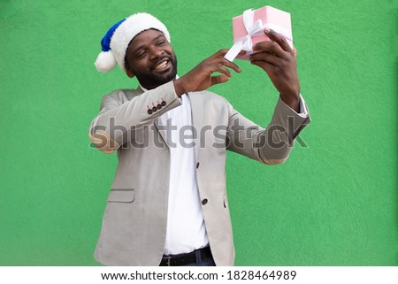 the Happy African American with a New Year's gift