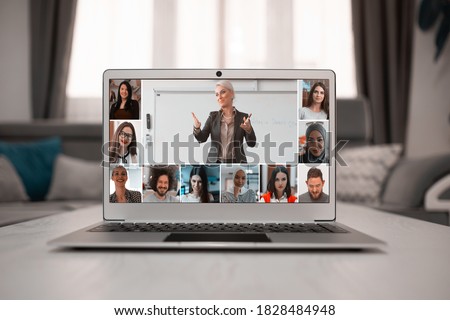 Online remote learning. Digital video conference chat with students. Teaching and learning from home during quarantine and coronavirus outbreak. Royalty-Free Stock Photo #1828484948