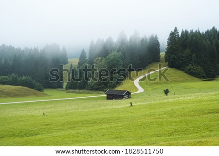 Beautiful misty morning in Bavaria, close to Geroldsee lake, Germany, famous viewpoint close to the bavarian Alps, Europe