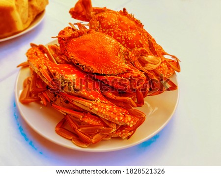 Steamed crab on white plate