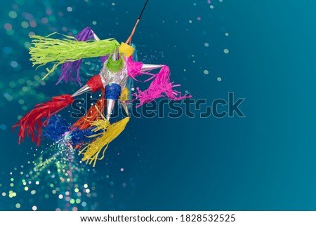 
mexican piñata for posada and birthday celebrations blue background