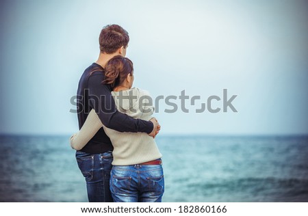 Happy Couple on beach  Royalty-Free Stock Photo #182860166