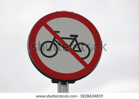 No bikes allowed sign on the street.