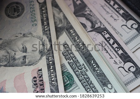 many banknotes of 20 dollars bills background. Money currecy profit business concept.