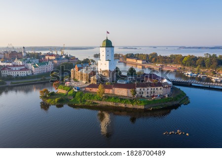 Vyborg city in autumn. View of the city medieval castle. Royalty-Free Stock Photo #1828700489