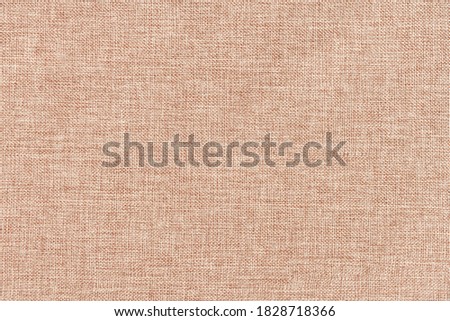 Beige cotton woven sofa cushion fabric texture background. High resolution photography